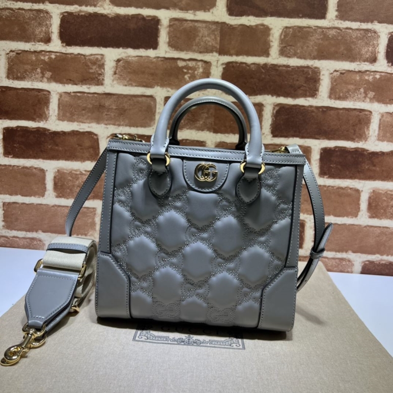 G*u*i shopping bags